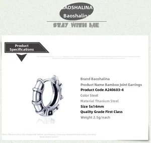 Detailed view of bamboo style titanium steel hoop earring in steel color finish