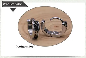 Detailed view of antique silver stainless steel hoop earrings with dragon totem texture