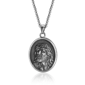 Vintage oxidized silver Jesus Christ oval pendant with embossed relief on bead chain
