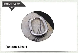 Detailed view of antique silver Mobius twist hoop earrings on a decorative stone