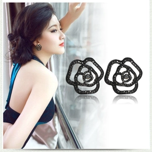 Gothic black rose stud earrings with shimmering rhinestones and hollow petal design