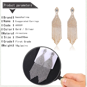 Detailed specs showing silver and gold tassel drop earrings with full rhinestone inlay