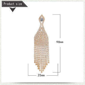 Detailed view of long crystal tassel earrings with 98mm length and 25mm width dimensions