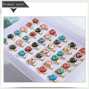 36-piece colorful heart resin gold rings set neatly displayed in a white jewelry gift box