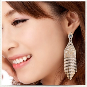Elegant gold drop earrings with sparkling rhinestones in a multi-strand tassel design