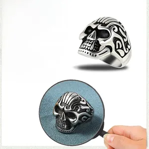 Detailed macro view of retro skull ring in antique silver finish made of stainless steel