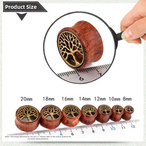 Detail of tree of life wood ear gauges showing various sizes from 8mm to 20mm on scale