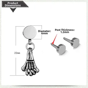 Detailed view of silver skull hand punk earring with 6mm disc size specifications