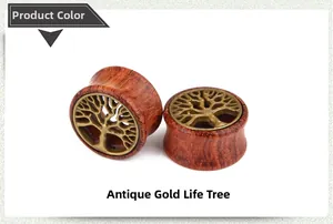 Detail view of reddish-brown wood ear plugs with vintage gold alloy Tree of Life design