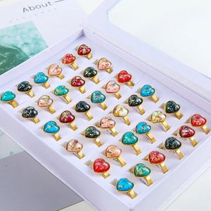 36-piece set of heart-shaped resin gold rings with colorful glitter in a white display box