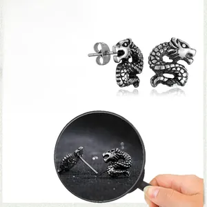 Detailed view of vintage stainless steel dragon hoop earrings with size and weight info