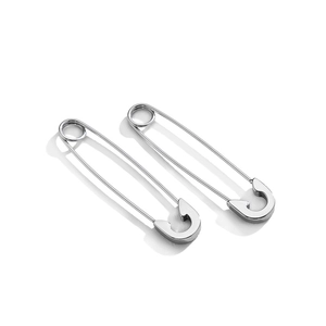 Polished stainless steel safety pin earrings in punk style shown on white background