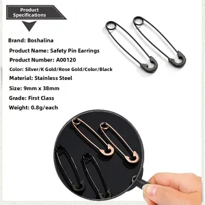 Macro detail of stainless steel safety pin earrings showing 38mm size and secure closure