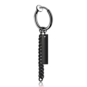 Close-up of matte black clip-on earring with industrial chain and rectangle tag pendant