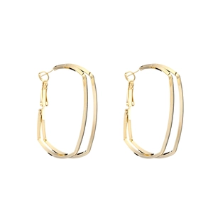Detailed view of large gold geometric hoop earrings with polished finish and layered frame