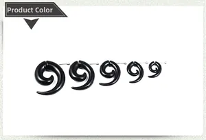 Set of five black spiral snail ear gauges in different sizes on a white background