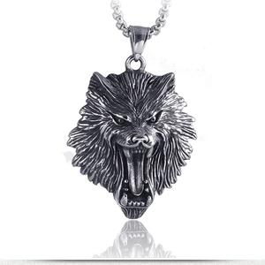 Close-up of a vintage wolf head pendant in silver stainless steel with detailed fur texture