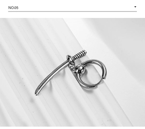 Detail of silver katana sword pendant earring on minimalist white textured background
