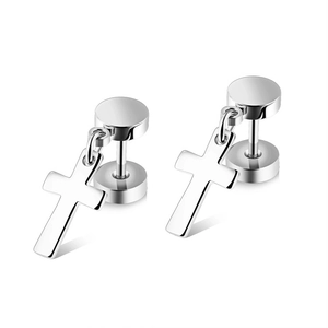Macro view of polished stainless steel cross earrings with sleek silver metallic finish