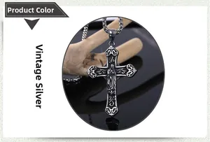 Detail of antique silver cross pendant with Madonna relief and vintage steel chain