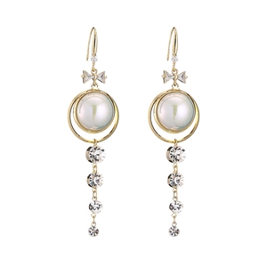 Élégantes boucles d'oreilles pompons dorées avec perles, nœuds en strass et cristaux géométriques