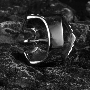 Retro stainless steel skull ring for men with punk industrial design on dark stone