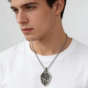 Retro stainless steel shield necklace for men featuring a Spartan warrior relief carving