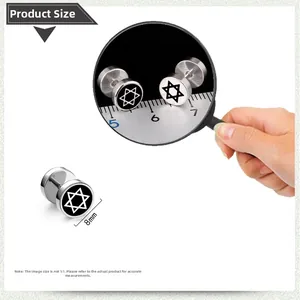 Détail d'une boucle d'oreille haltère de 8mm en acier avec motif hexagramme noir