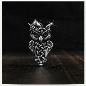 Vintage stainless steel owl pendant necklace with intricate Celtic knot engraving
