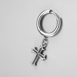 Minimalist silver stainless steel hoop earring featuring a textured cross pendant charm