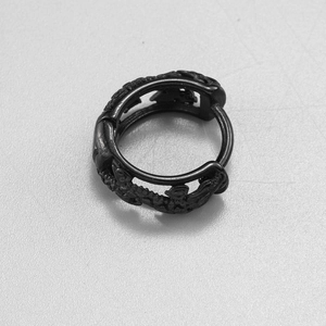 Minimalist black stainless steel dragon hoop earring with detailed relief engraving