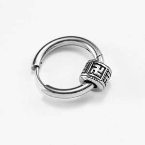 Minimalist stainless steel hoop earring with a vintage engraved rotating bead charm