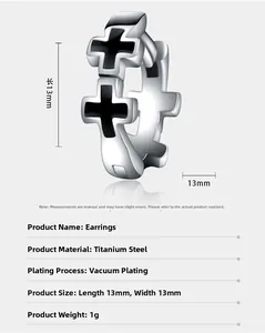 Macro view of silver titanium steel earrings with black cross and 13mm size specs