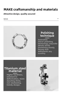 Macro detail of titanium steel earrings with mirror polish finish and cross relief design