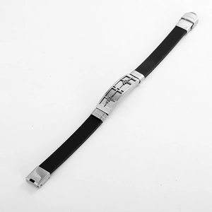 Black silicone bracelet with stainless steel hollow heartbeat design and secure folding clasp