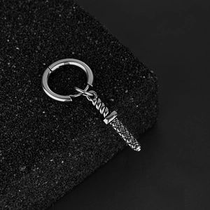Minimalist silver stainless steel hoop earring with detailed sword dagger pendant