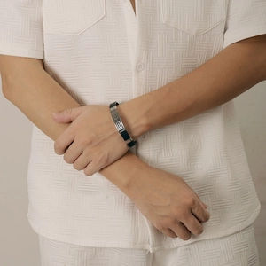 Men's hollow stainless steel and silicone bracelet with engraved cross pattern charm