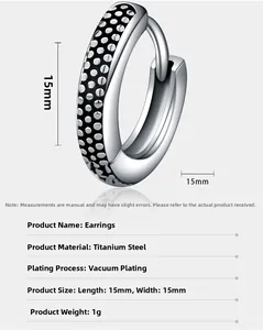 Detail view of 15mm titanium steel earring with black dot grooves and vacuum plating
