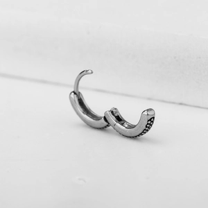 Minimalist vintage silver titanium steel huggie earring with granulated texture side detail