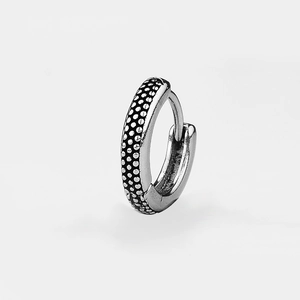 Retro stainless steel hoop earrings with textured dotted relief in vintage silver finish