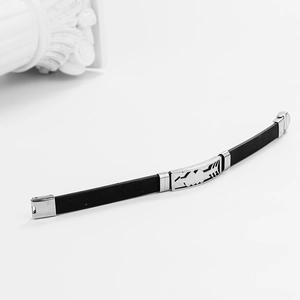 Minimalist black silicone and stainless steel bracelet with geometric pattern engraving
