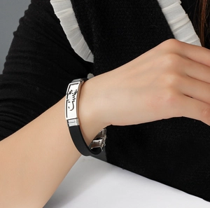 Men's hollow stainless steel and black silicone bracelet featuring engraved scorpion totem