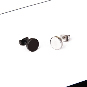 Minimalist punk rock style barbell earrings in matte black and polished silver steel
