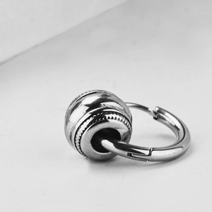 Boucles d'oreilles créoles en acier inoxydable argenté avec perle rotative décorée