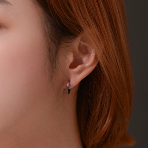 Minimalist stainless steel hoop earrings with textured vintage woven pattern finish