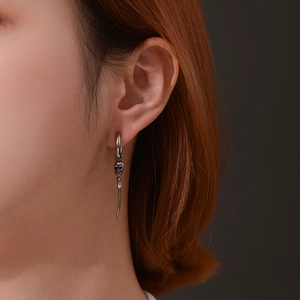 Punk style stainless steel skull sword drop earrings for a minimalist gothic look