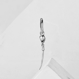 Punk style stainless steel hoop earring with skull charm and long curved spike pendant