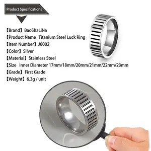 Detailed specs of titanium steel spinner ring with black vertical stripes and sizing info