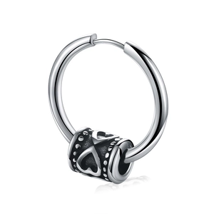 Minimalist silver steel hoop earring with black heart cylinder charm on white background