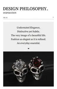 Macro detail of skull stud earrings with sparkling cubic zirconia and vintage silver finish